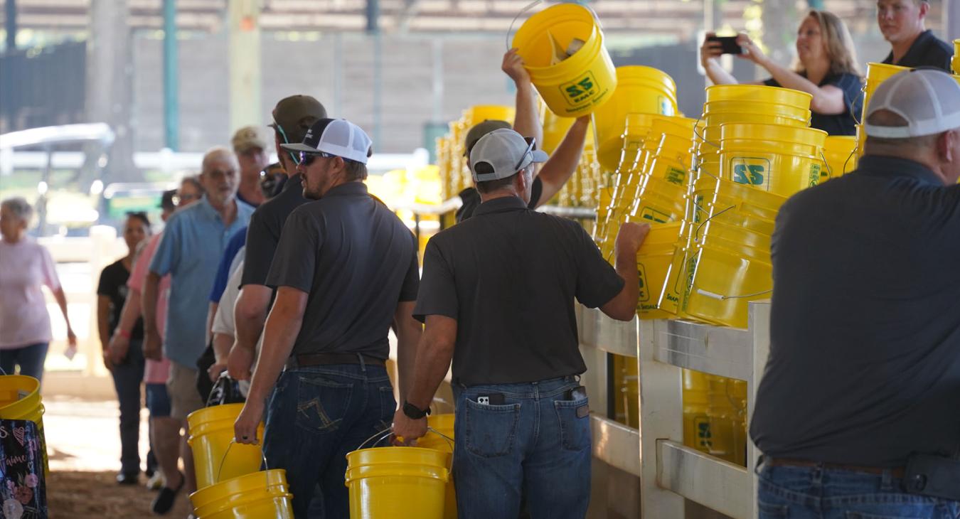 SSEMC Employees prepare buckets for members