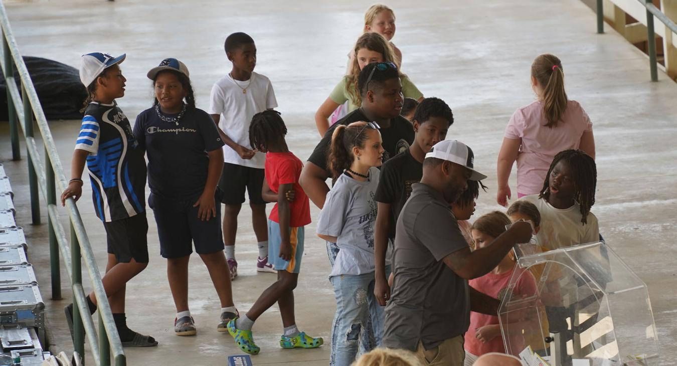 Volunteer Children help to select door prize winners