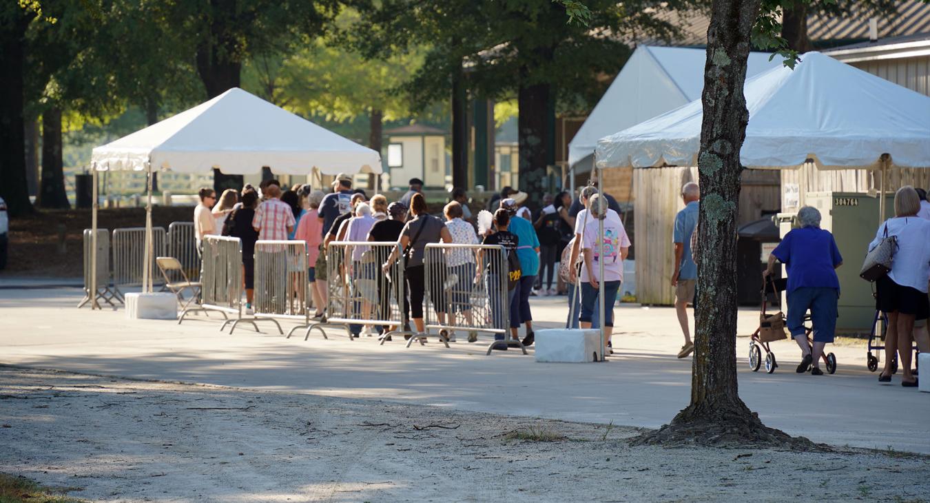 Members wait in line before registration begins