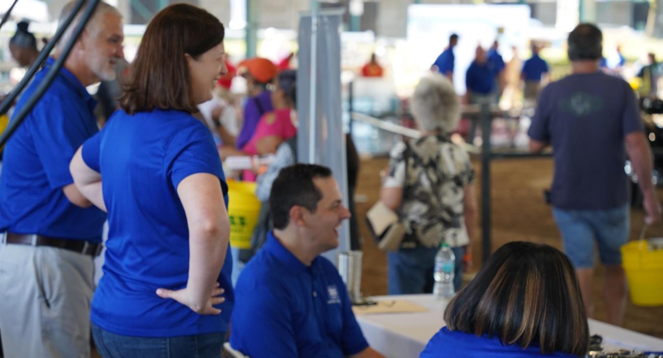 Snapping Shoals employees smile, interacting with members