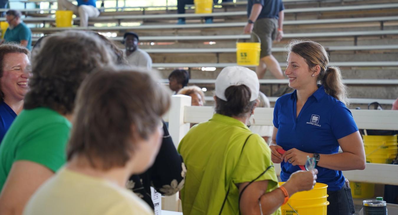 Snapping Shoals employees smile, interacting with members