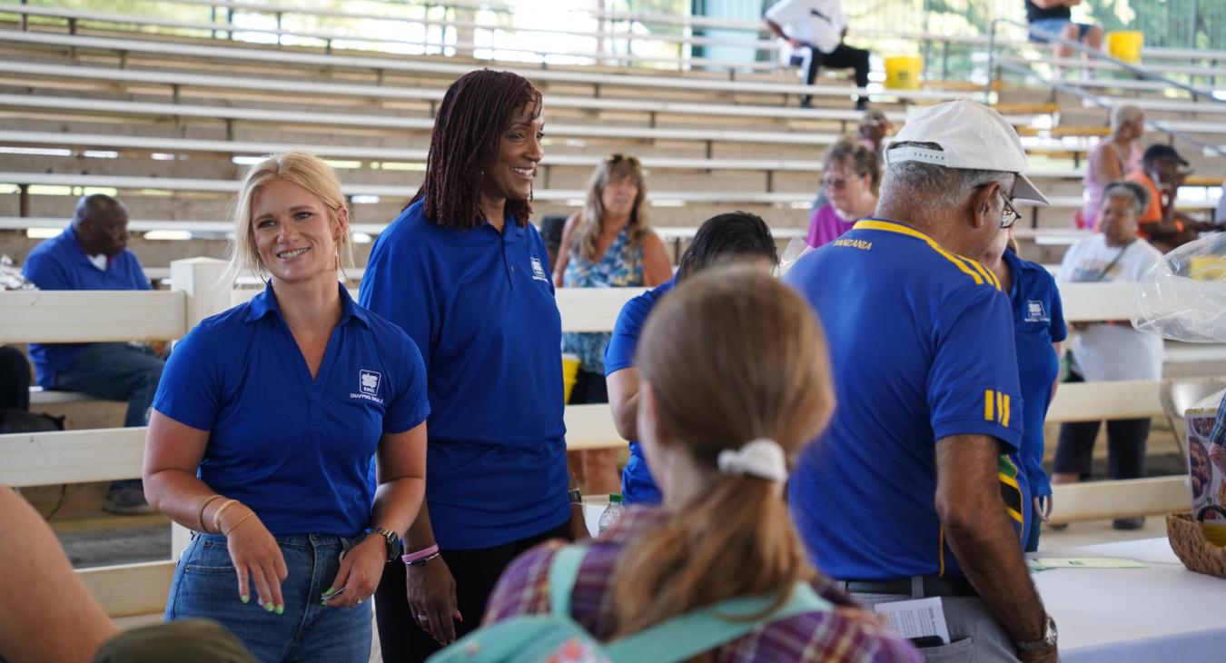 Snapping Shoals employees smile, interacting with members