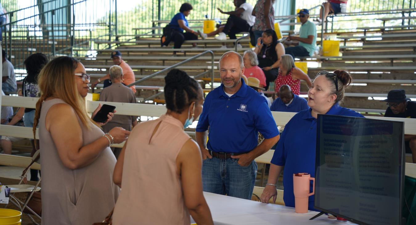 Snapping Shoals employees smile, interacting with members