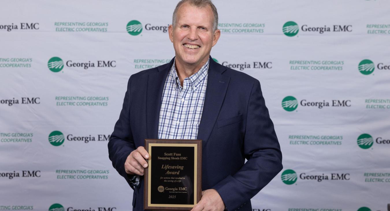 Scott Fuss was recently recognized for two heroic actions with the Lifesaving Award by Georgia EMC at the GEMC Annual Meeting